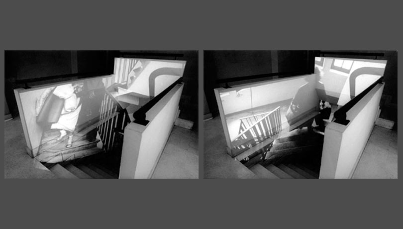 projection de photographies dans un escalier, installation lors du Mois de la photo de Paris
